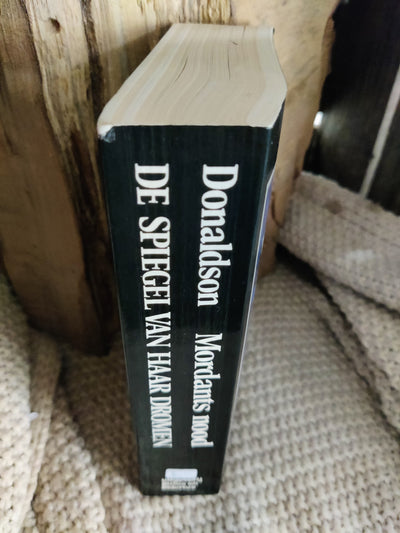 De spiegel van haar dromen